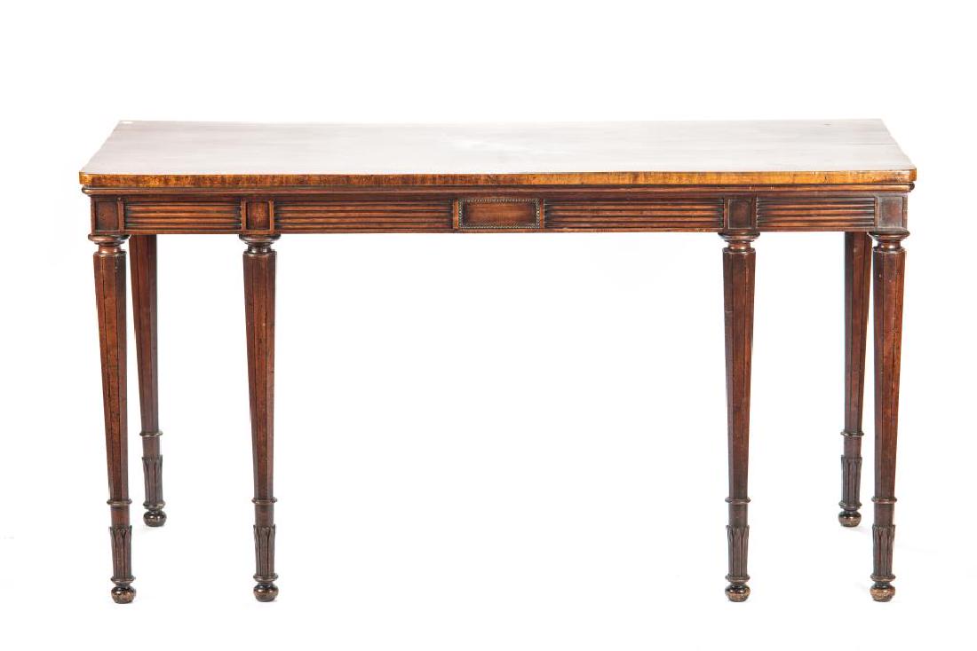 IRISH GEORGE III MAHOGANY SIDEBOARD: On reeded legs. H. 35 W. 63 1/2 D. 26 1/4 in.From the collection of Senator Nicole Eaton, Eaton Family, Toronto.