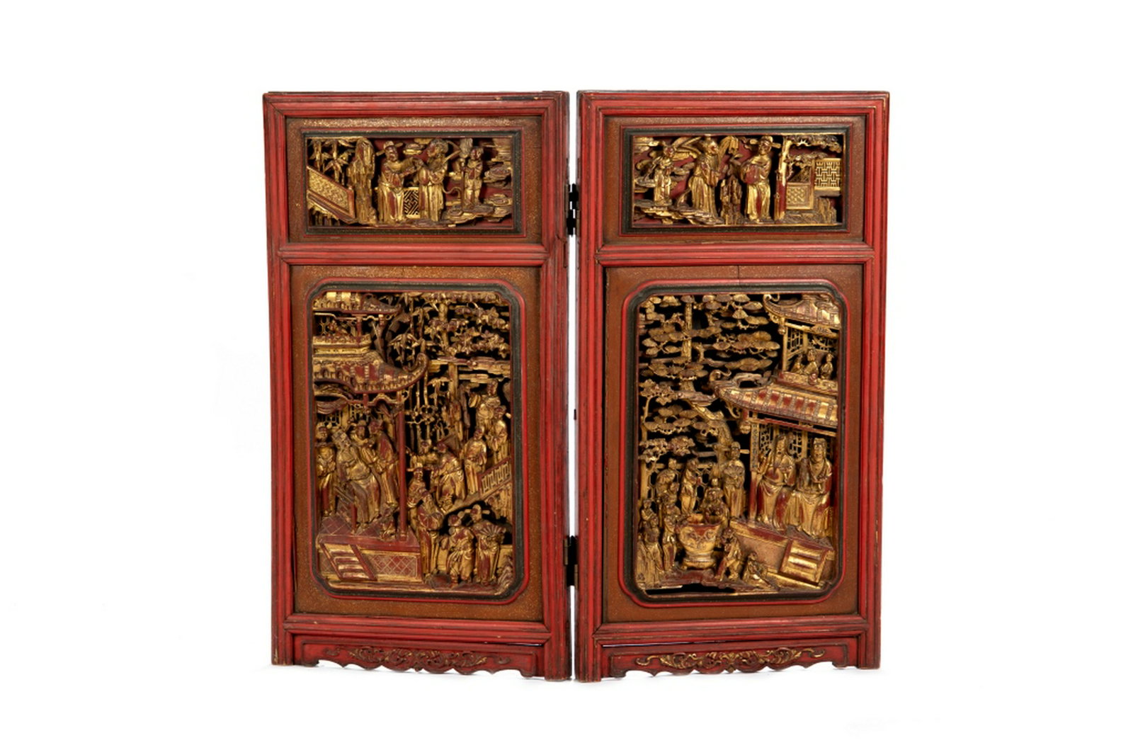PAIR OF CHINESE LACQUERED AND GILT WINDOW PANELS: Joint by metal hinges to form a folding screen. Total four openwork carved panels of figural scenes. Panel size (each) 83 x 45cm (32 3/4 x 17 3/4 in.)