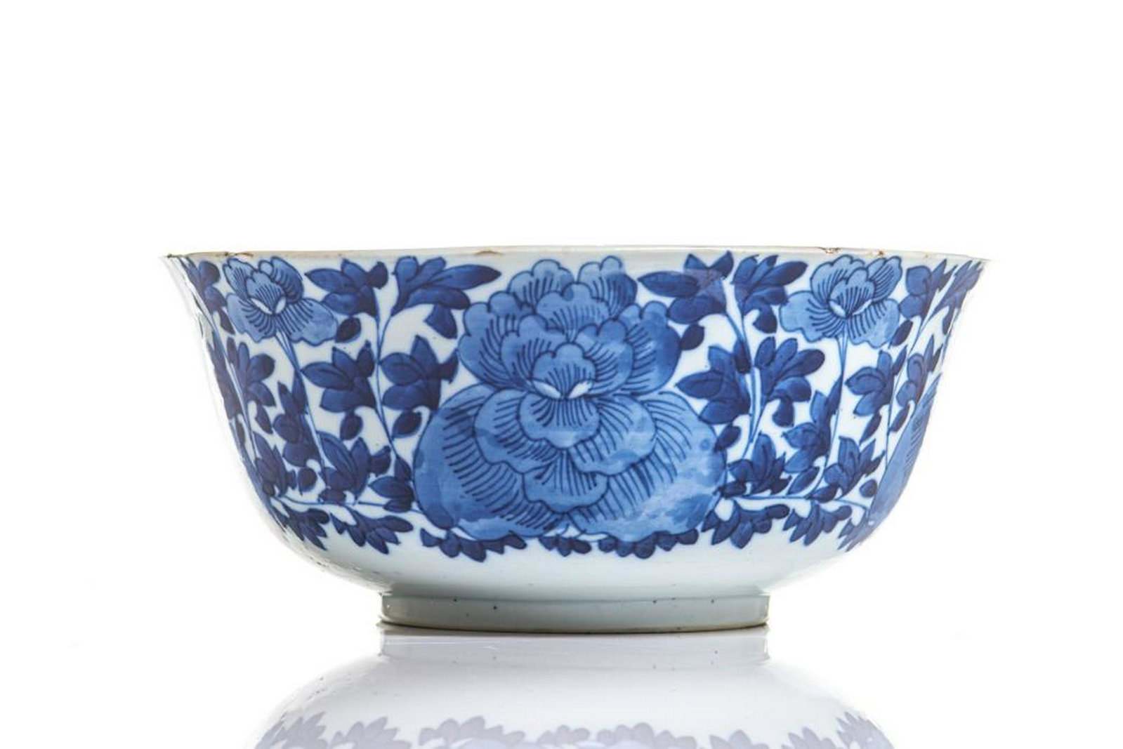 LARGE CHINESE BLUE & WHITE PORCELAIN BOWL: Exterior painted with peonies floral sprays. Ruo Shen Zhen Cang mark to base, 19th C. Top dia. 21cm (8 1/4 in.) H. 9cm (3 1/2 in.)