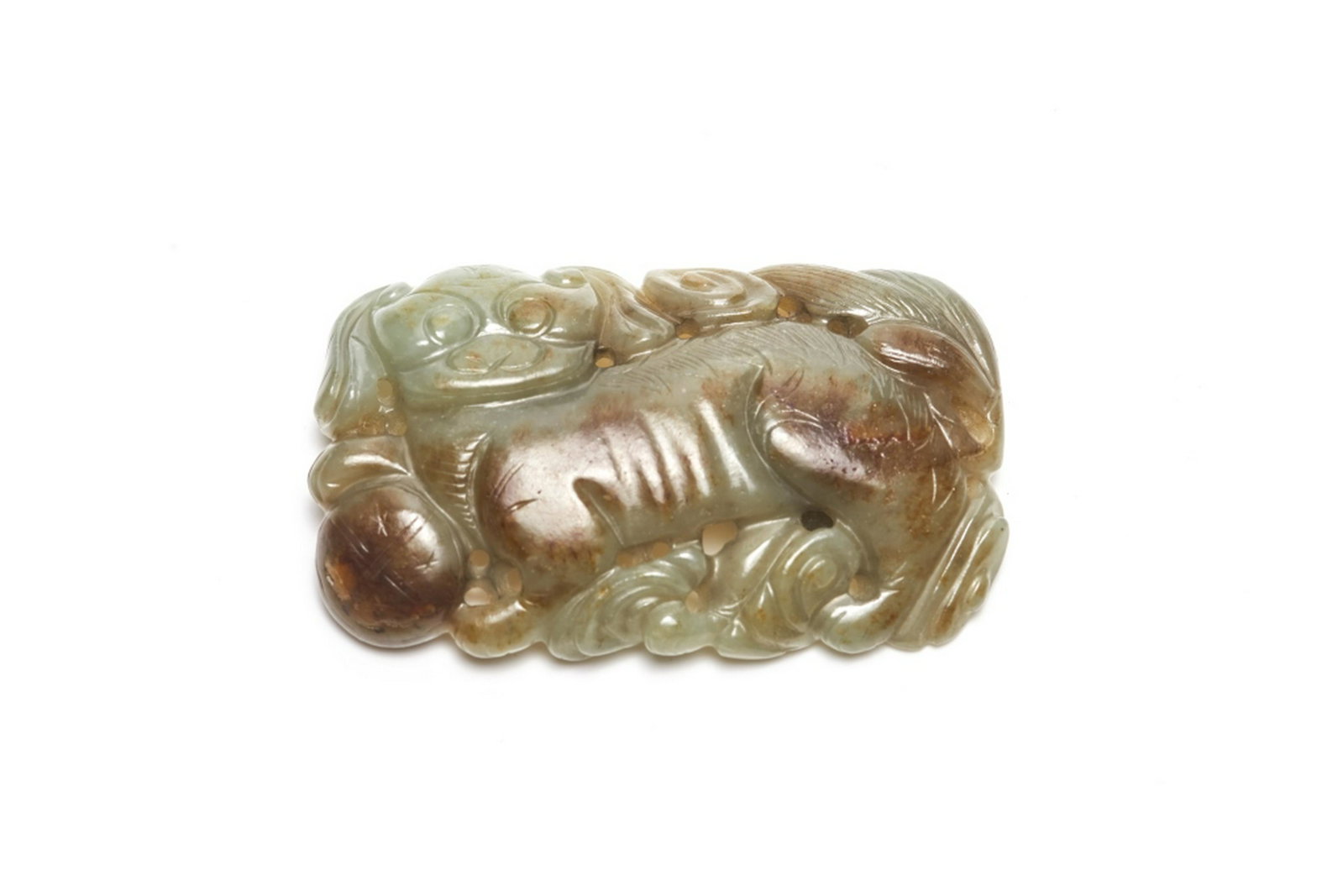 CHINESE CELADON AND RUSSET JADE BELT BUCKLE PLAQUE: Carved with a fu lion with silk balls and lingzhi ruyi. Two studs carved to reverse. Size: 5.5 x 8.5cm (2 1/8 x 3 3/8 in.)