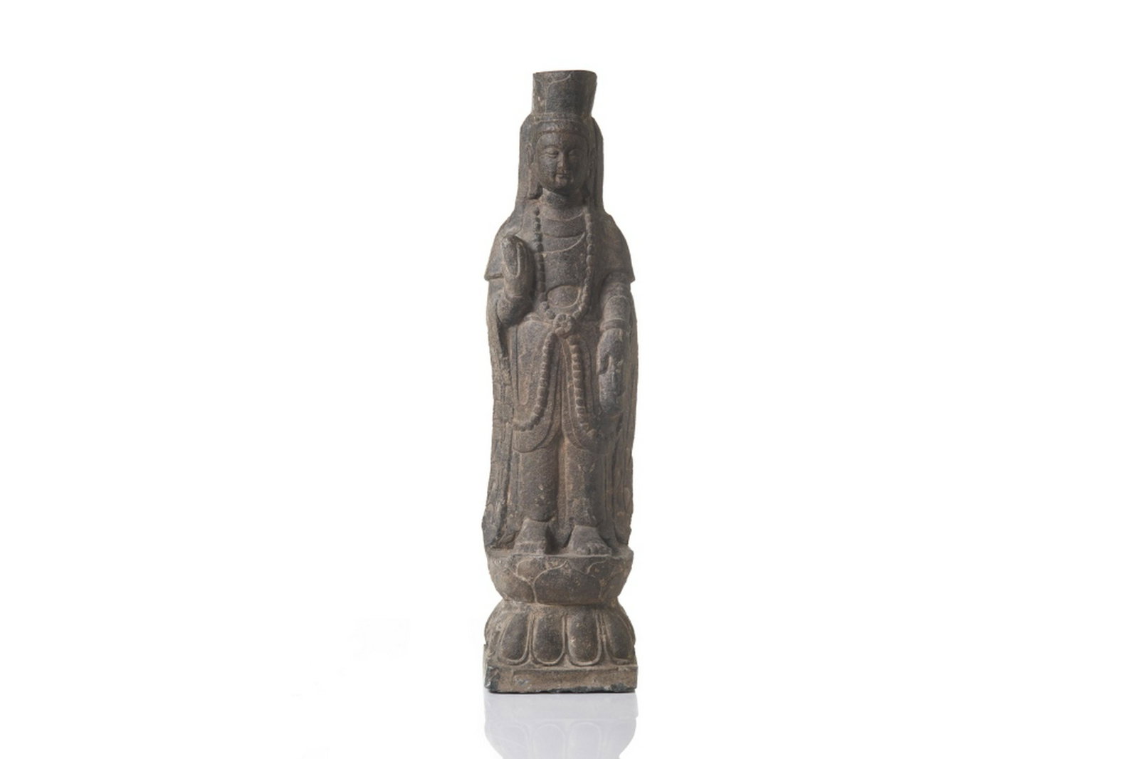 CHINESE STONE CARVED BODHISATTVA STATUE: Standing on a lotus base and holding implements in hand. Six dynasties style. H. 65cm (25 1/2 in.)