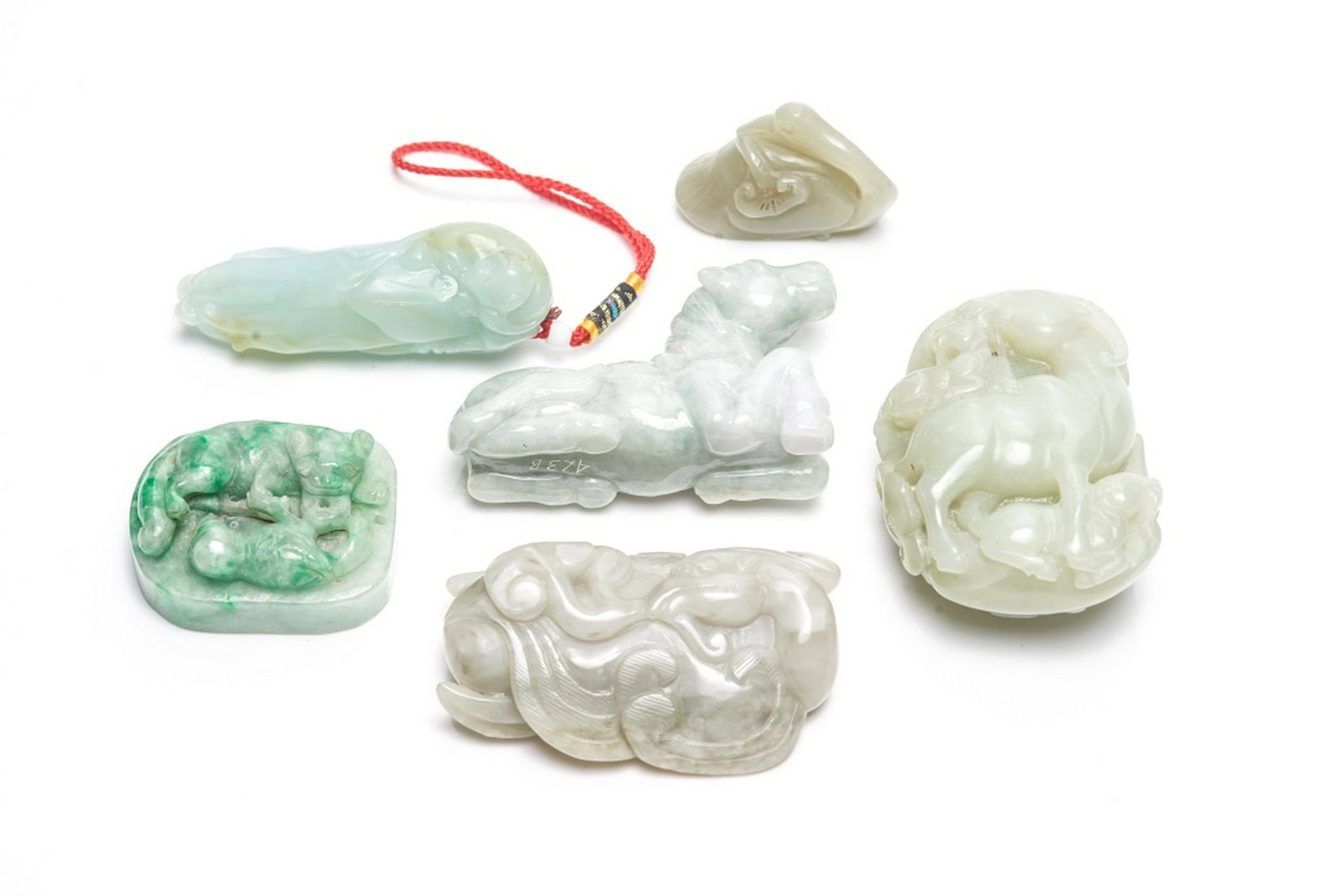 GROUP OF 6 CHINESE JADE CARVINGS: Carved as animals and buddha hand citron. 1 plaque carved out of jadeite. Tallest: 8cm (3 1/8 in.)