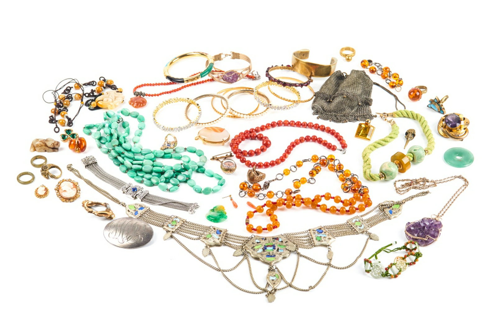 LARGE LOT OF COSTUME JEWELLERY: Beaded, bronze pieces, necklaces and bracelets. Including an Art Deco amber necklace with clasp marked 835.