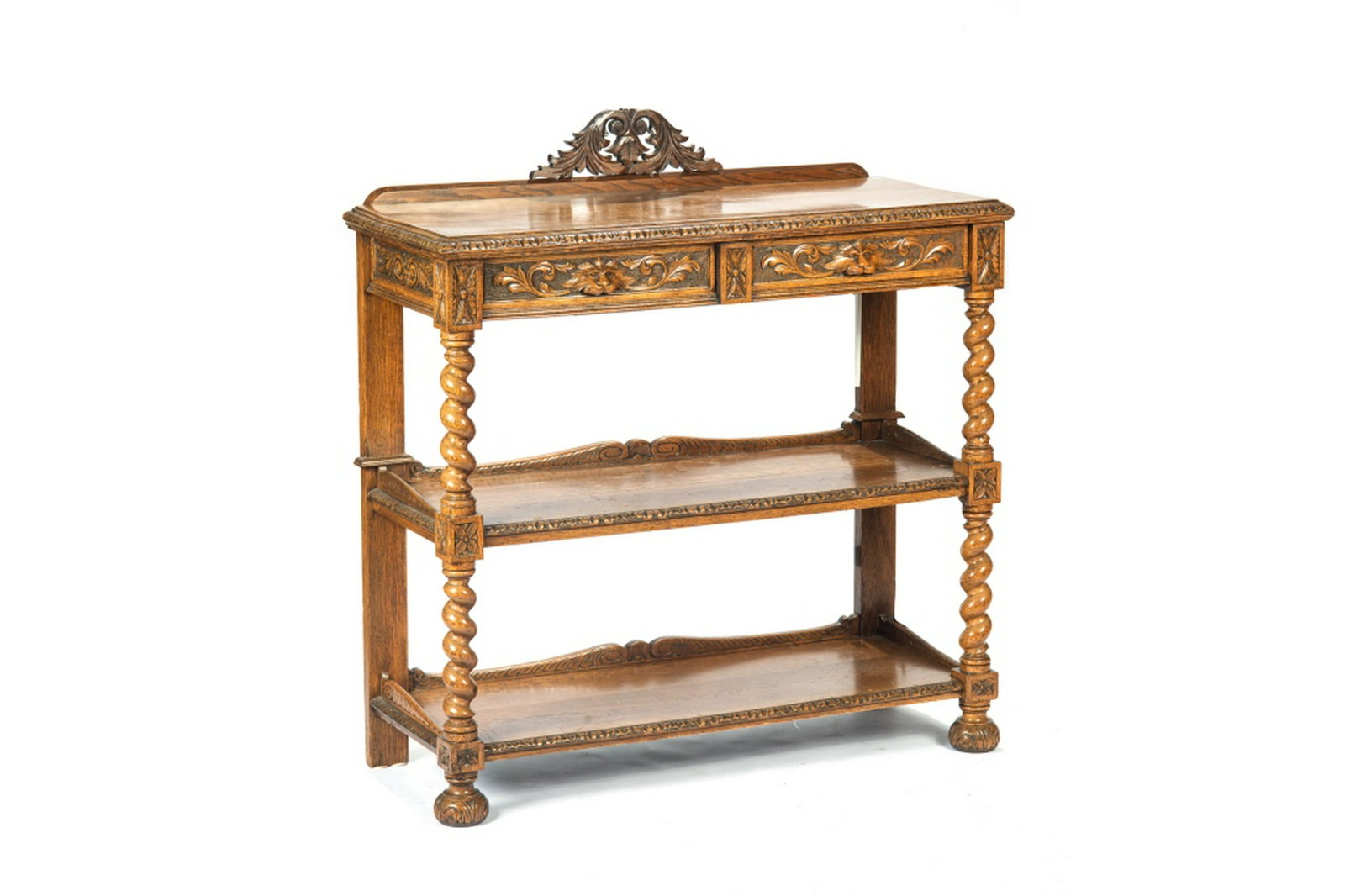 JACOBEAN CARVED OAK BUFFET: Barley twist support and carved lion mask drawers. H. 52 1/2 W. 50 1/2 D. 21 1/2 in.