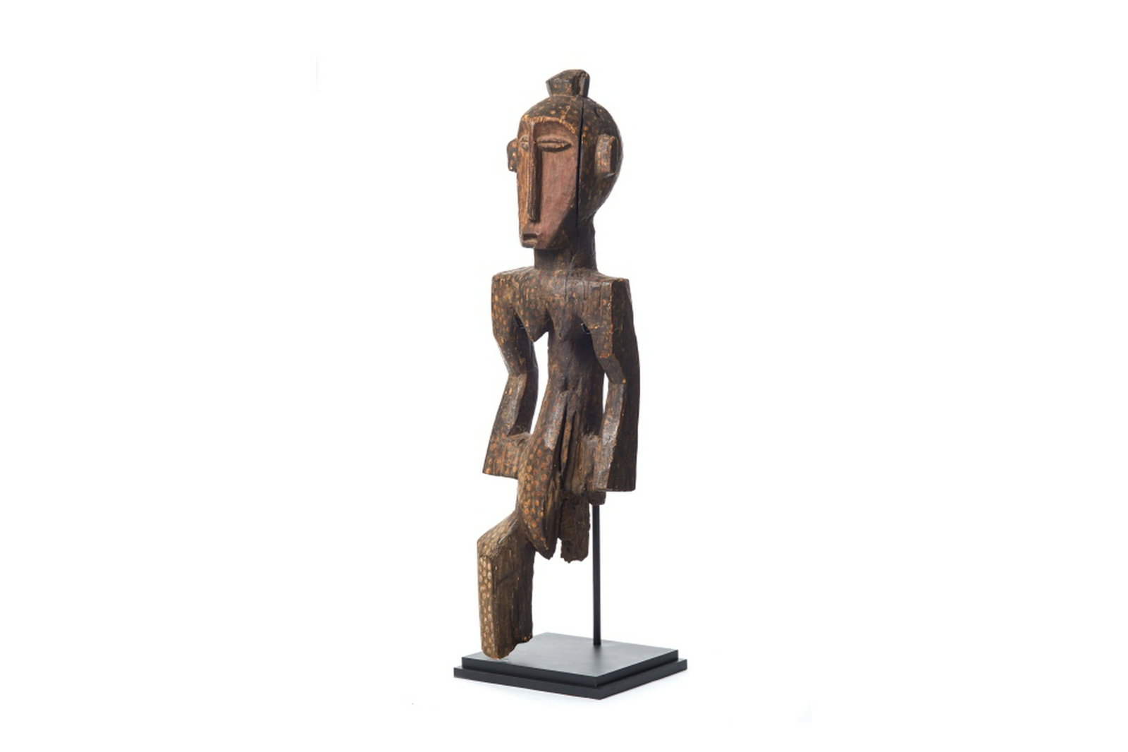 CARVED WOOD PAINTED AFRICAN TRIBAL FIGURE: Possibly from Songye people of the Congo, based on squared mouth and form of the body. Body is marked with painted dots. H. 119 cm (46 3/4 in) [including base] Provenance: The Joey and Toby Tanenbaum 