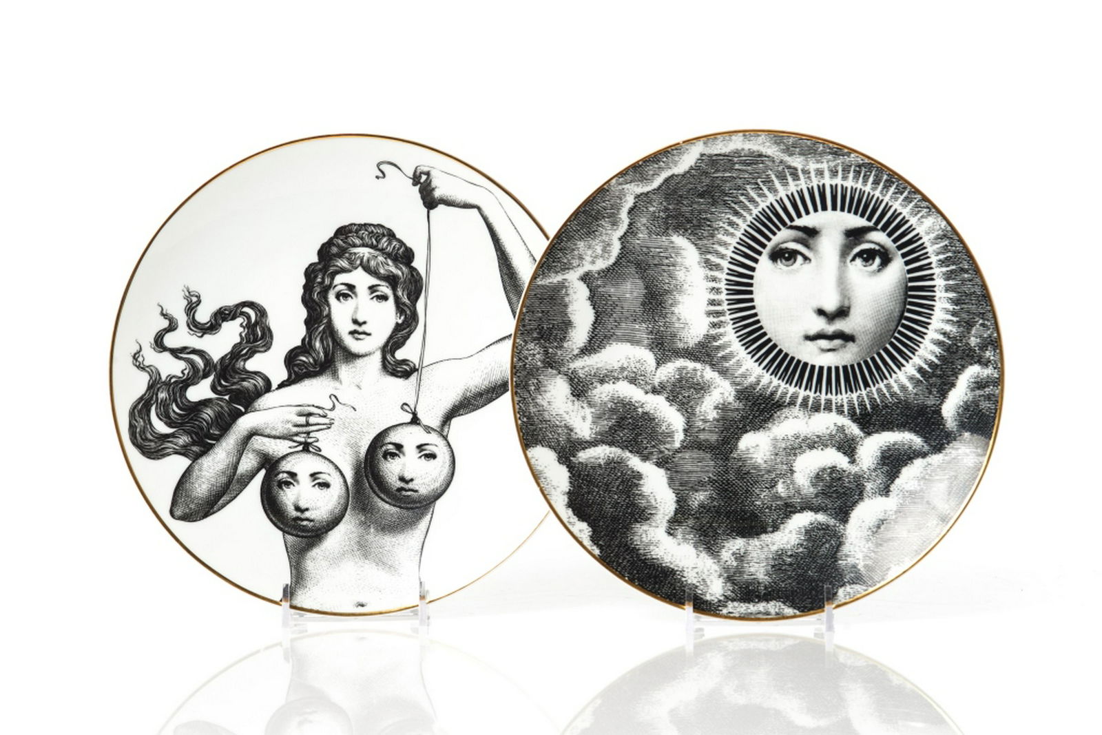 PIERO FORNASETTI FOR ROSENTHAL TWO PLATES: "Temi e variazioni" Motiv #17 and Motiv #18 designs, monochrome with gilt rim. Diameter of each 24 cm (9 3/8 in)
