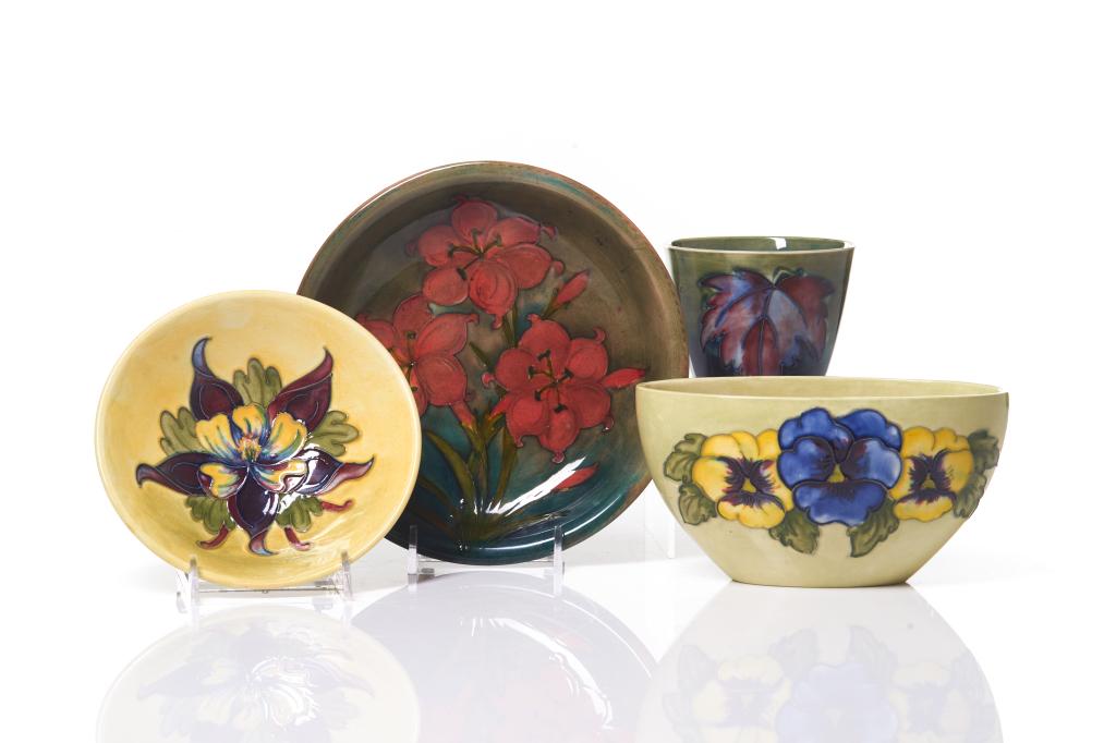 LOT OF ASSORTED MOORCROFT POTTERY: 4 pieces in total, Pansy patterned oval bowl, yellow ground H. 8.5 cm (3 3/8 in), Across 17 cm (6.5 in) paper mark to bottomColumbine patterned bowl, yellow ground Diameter. 14.5 cm (5 3/4 in) imprint