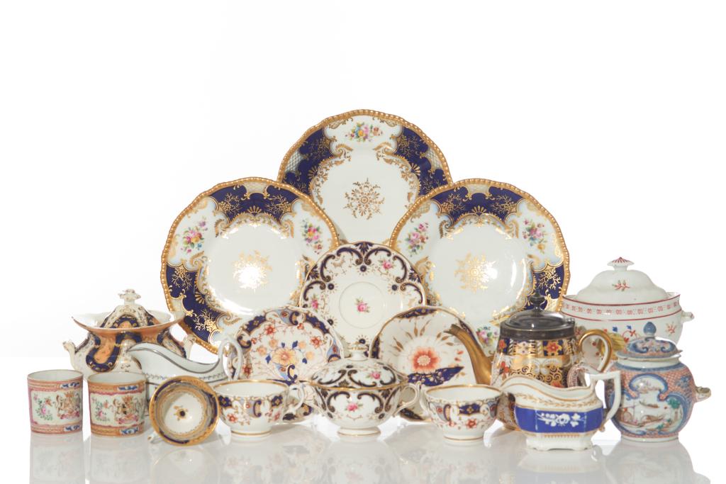 ASSORTED LOT OF PORCELAIN TEA AND DINNERWARE: Lot includes 8 teacups, 3 saucers, 3 luncheon plates, 2 covered tureens, 2 creamers, one sugar and teapots. Mostly English