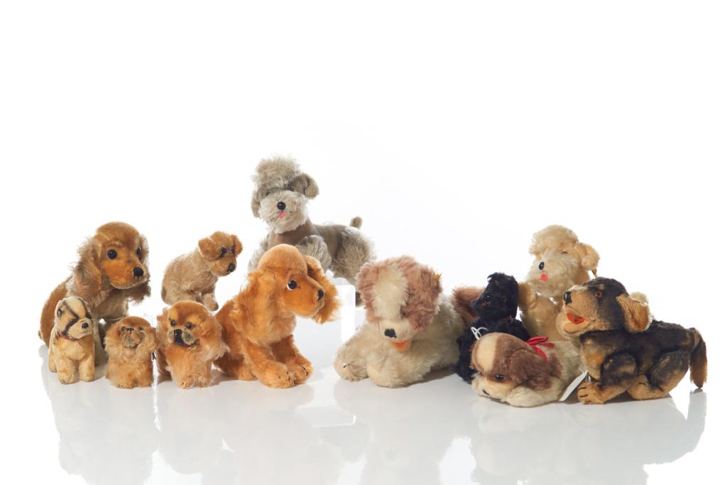 ASSORTED DOG MINIATURE STEIFF STUFFED ANIMALS: Eleven vintage assorted dogs including schnauzers and spaniels. Miniature sized. H. 6.5 in.