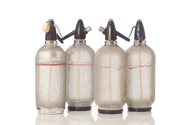 Four Vintage Soda Water Syphon Bottles