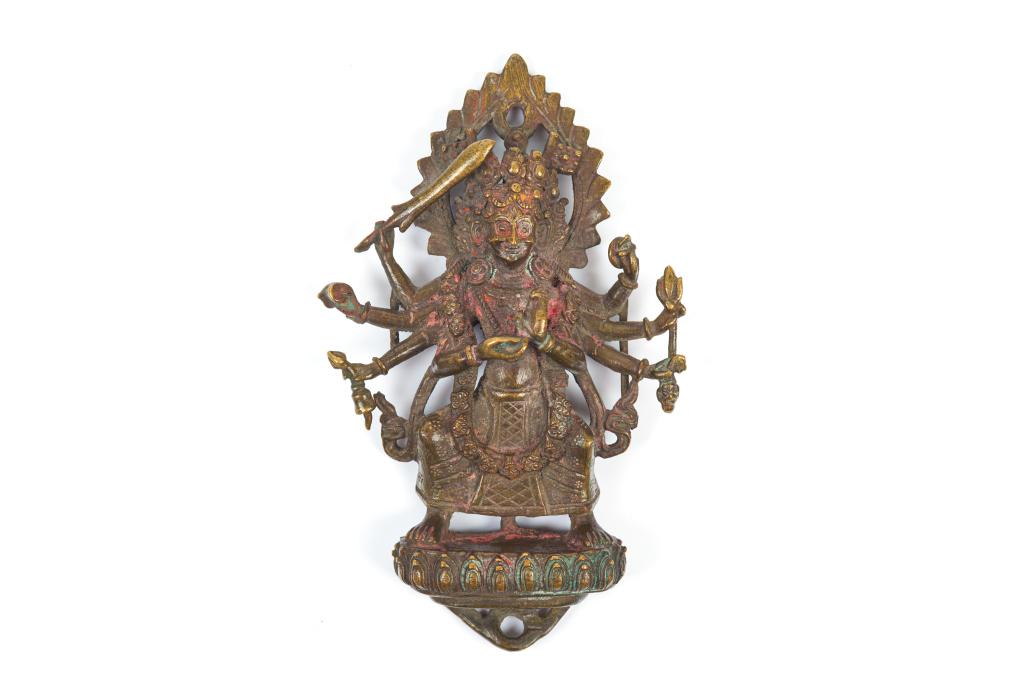 18TH C. NEPAL BRONZE FIGURE OF KALI: The fierce figure with eight armed and wearing a garland of severed heads, standing on a lotus base. With hinges to fixing to wall. H. 16cm (6 1/8 in.)