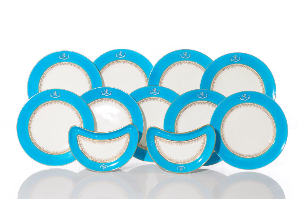 MINTON TURQUOISE GROUND DINNER PLATES: With pÃ¢te-sur-pÃ¢te crest and motto, reading "valor virtus fides". Comprising nine dinner plates and two bone plates. Dia. of dinner plate: 26.4 cm (10 3/8 in.)