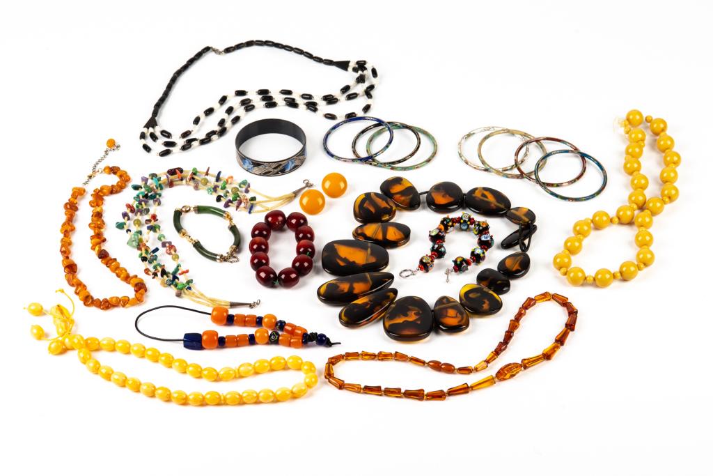 LOT OF BEADED AND ENAMEL JEWELLERY: Including eight enamel bangle bracelets, eight beaded necklaces, three beaded bracelets and a pair of clip earrings.