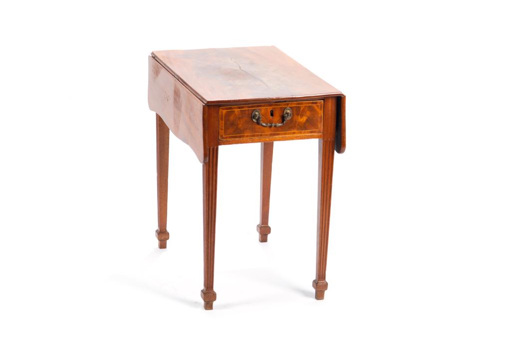 GEORGE III FLAME MAHOGANY PEMBROKE TABLE: Georgian drop leaf table with tapered legs and an inlaid drawer. Mid to late 18th century. H. 28 W. 29 D. (without leaves) 18 1/4 D. (with leaves) 33 in.