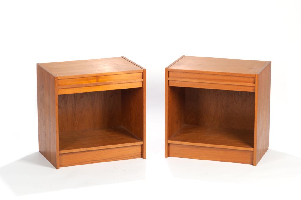 PAIR OF MID C TEAK NIGHTSTANDS: Rectangular cube tables with one drawer. No hardware on drawer. Open shelf below. Skirted foot and nailed back. Stamped "Made in Denmark" on reverse. H. 21 3/4 W. 22 D. 15 in. Condition noted.
