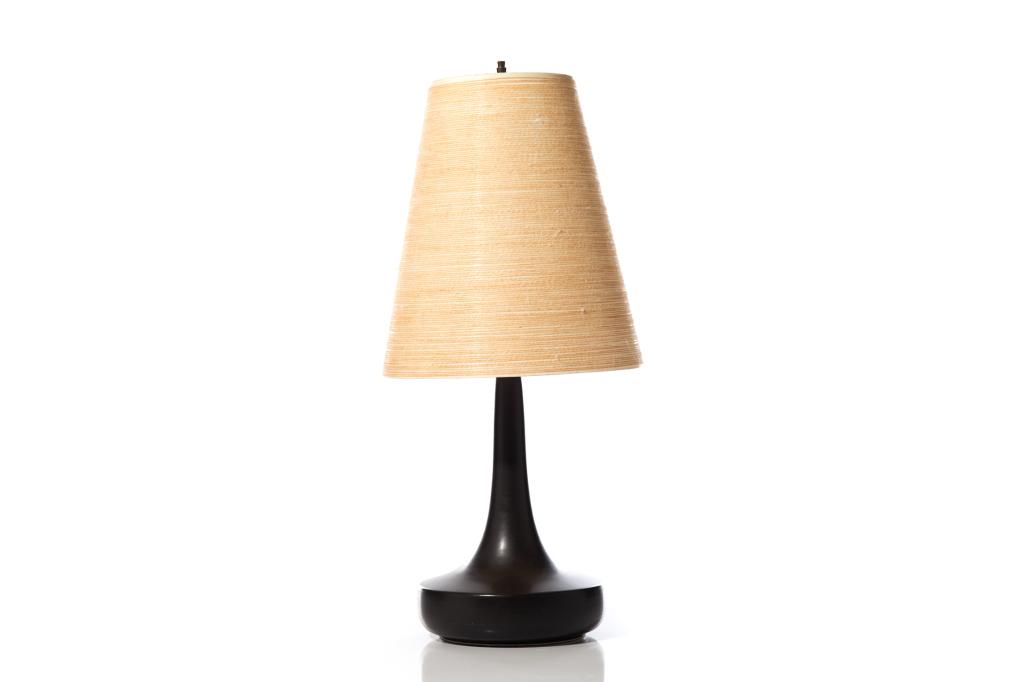 LOTTE STUDIO POTTERY LAMP: A mid century modern Scandinavian design grey-black pottery or stoneware based lamp with a wound fiberglass shade. Model 1400 with Canadian wiring. Original design by Lotte and Gunnar Bostlund. Not si