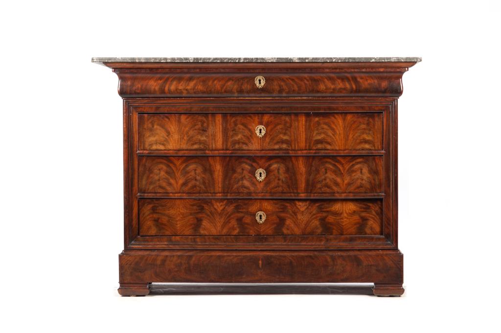 FRENCH 19TH C LOUIS PHILIPPE MARBLE TOP COMMODE: Flame mahogany, four drawer chest with bronze escutcheons. Mottled grey marble top with double beveled edges. H. 96 cm (37 3/4 in) W. 130.5 cm (51 3/8 in) D. 56.5 cm (22 1/4 in)
