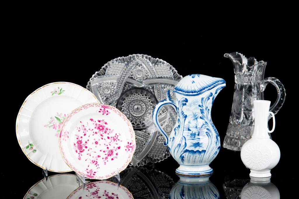 LOT OF PORCELAIN & CUT GLASS: Including a Meissen pink and gilded bowl (with chip to rim), a KPM flowered soup bowl, a blue porcelain pitcher, a white porcelain bud vase, and a cut glass pitcher.