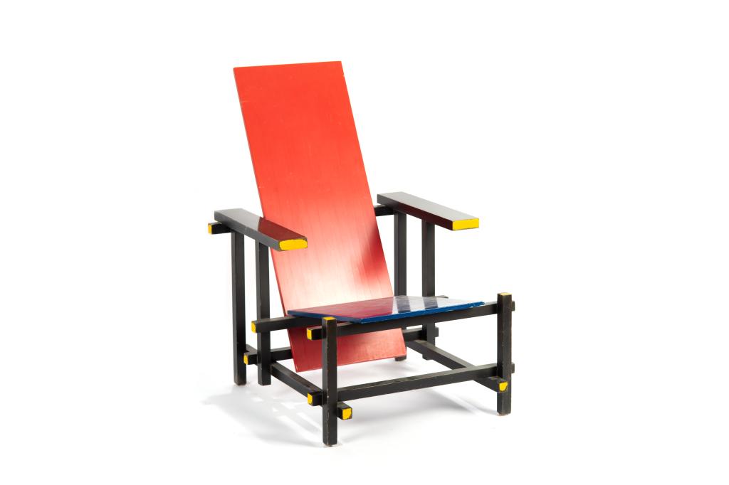 AFTER GERRIT RIETVELD RED & BLUE ARMCHAIR: By Cassina, numbered 1358 in the DeStijl Bauhaus style. In the manner of Gerrit Rietveld (1888-1964).