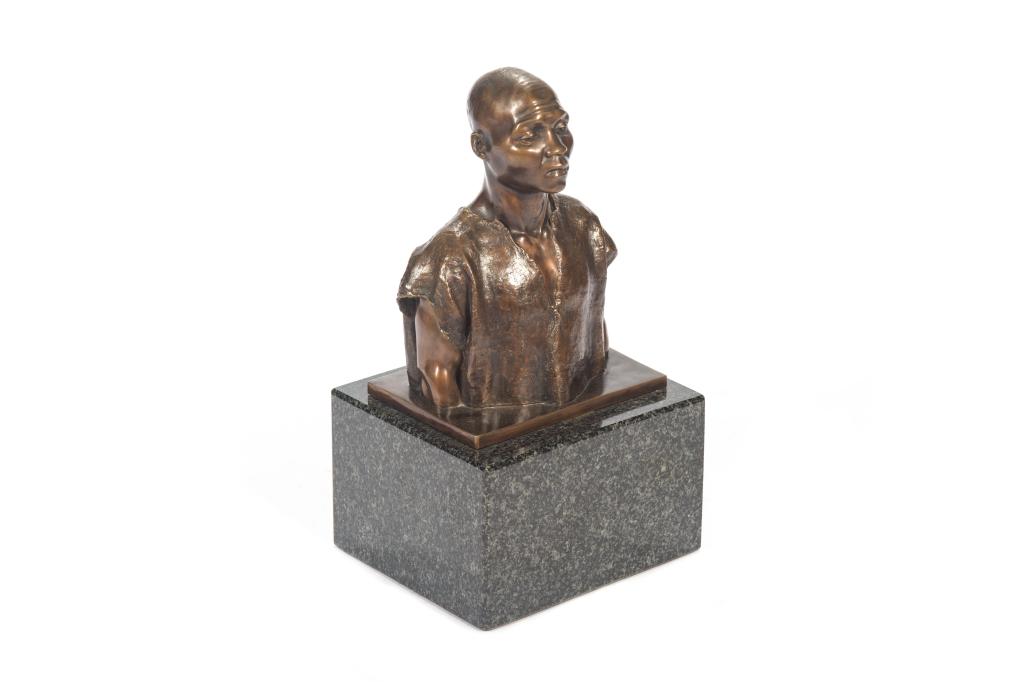 After VAN WOUW, ANTON (Dutch, 1862-1945): Titled "The Accused". Bronze bust of a man with brown patina, mounted on a black granite base. Inscribed on back left shoulder of figure with artist name, dated 1907. H. not including base: 29.5 cm (1