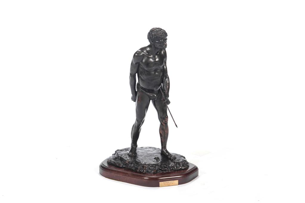 After ANTON VAN WOUW (Dutch, 1862-1945): Bronze sculpture, entitled "Bushman Hunter" and dated 1902. Artist name and title engraved on small plaque mounted on wood base. Signature and date inscribed on sculpture. H. including base: 49.5 cm (