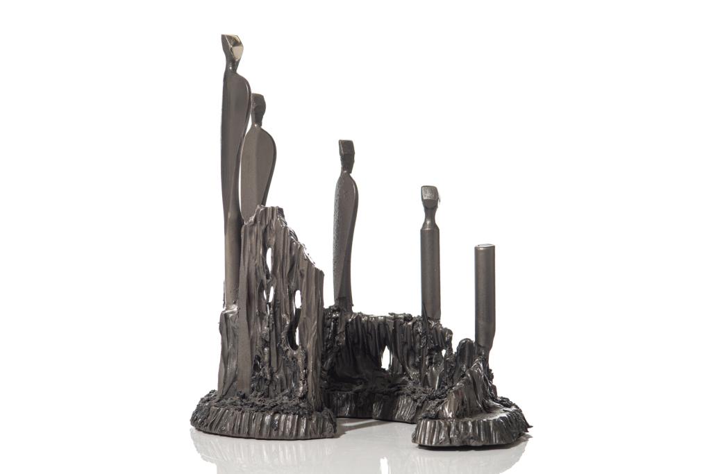 KRAMER PROGRESSION SCULPTURE: Either by Richard or Boris Kramer. A contemporary steel sculpture titled "Progress", 2000, number 19. Sculpture depicts a progression of figures over a heavily textured base, ending with a polished ex