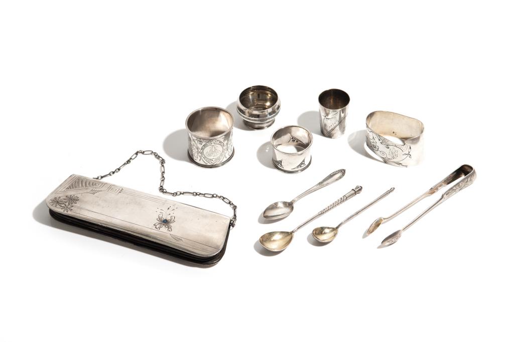GROUP OF RUSSIAN SILVER ITEMS, 224g: Including a silver mounted purse, shot glass, three napkin rings, sugar tongs, spoons etc. Various dates and makers Weighable silver 224g (not including purse)