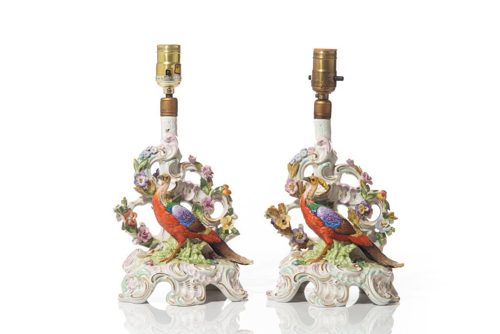 PAIR OF CARL THIEME DRESDEN PORCELAIN LAMPS: German, early 20th century. White ground with applied floral decorations and a male and female polychrome pheasant on each. On raised bases with gilded and pastel accents. Potschappel Thieme stamp mar