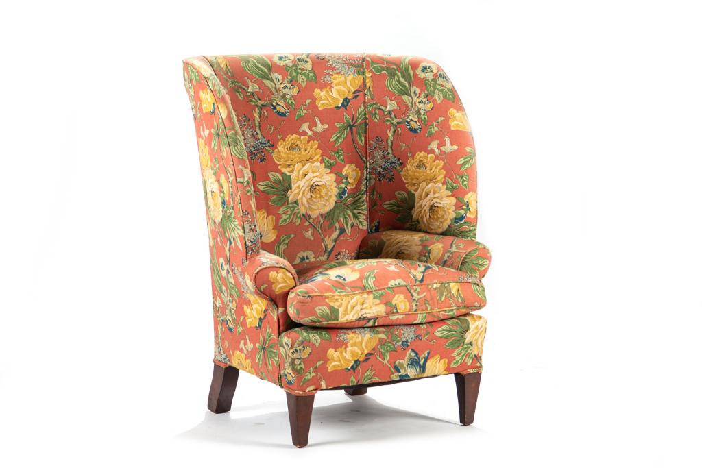 VINTAGE FLORAL UPHOLSTERED WINGBACK CHAIR: Tub form with hardwood legs.