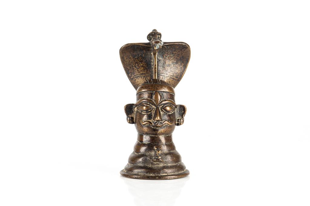 18TH C. INDIAN BRONZE SHIVA MUKHALINGA: Finely cast with a shiva headed cone form base, a cobra shape insert to back. H. 15.9cm (6 1/4 in.) Condition report available upon request.