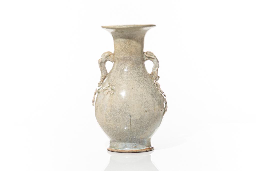 CHINESE CRACKLE GLAZED PRUNUS HANDLE VASE: Ming to Qing dynasty. H. 32.5cm (12 3/4 in.) Condition report available upon request.