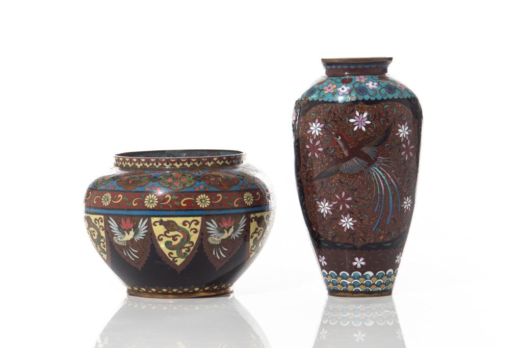 JAPANESE CLOISONNE ENAMELLED JAR & VASE: Meiji Era (19th c. to early 20th c.) Includes vase with floral black, brown, and blue detailing. Jar with red and blue floral designs. Height of Vase: 22cm (8.6 inch.) Width of Jar: 18cm (7 inch.)Cond