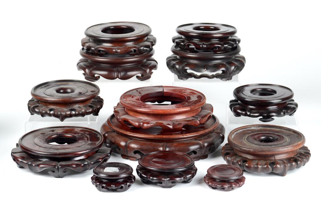 GROUP OF THIRTEEN CHINESE CIRCULAR HARDWOOD STANDS (1 of 12)