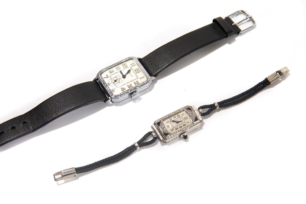 TWO LADIES ART DECO BULOVA WRIST WATCHES: The smaller watch testing 14k white gold and accented with synthetic blue sapphires in each corner.