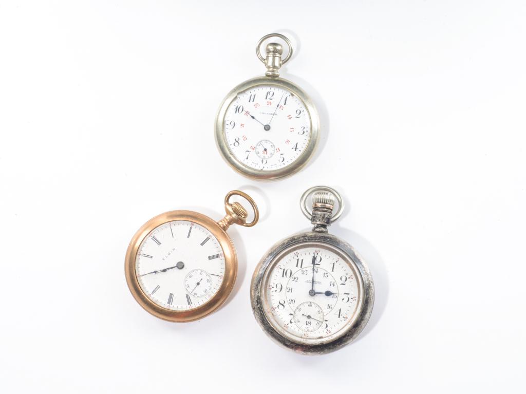 THREE POCKET WATCHES: One Elgin, one Crusader, and one J. S. Walker pocket watch. Dia. of largest: 6.4 cm (2 3/8 in.)