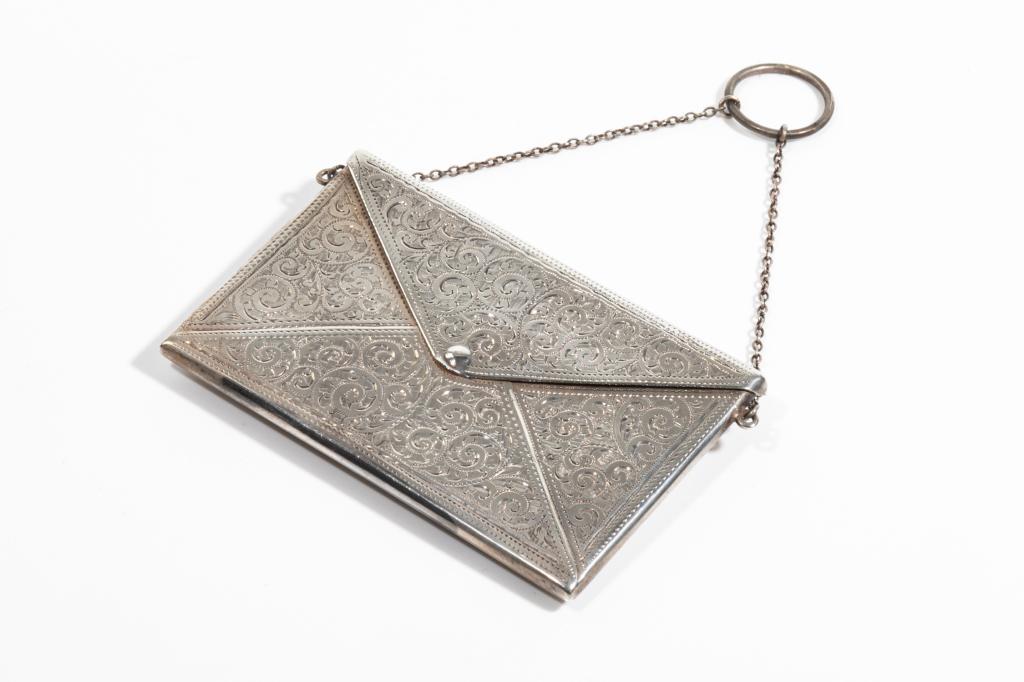 ENGLISH SILVER ENVELOPE FORM CARD HOLDER, 62g: With an overall scroll pattern, monogrammed and chain detail. Birmingham, 1915. Maker, Adie & Lovekin Ltd.L. 9.5 cm (3 3/4 in.)