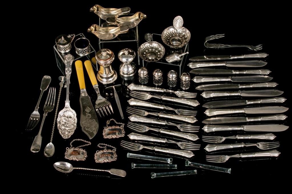 LARGE GROUP OF ASSORTED SILVERPLATE ACCESSORIES: Including salt and pepper grinder, assorted flatware, two small salt and pepper pairings, two French ivory handled serving utensils, etc.