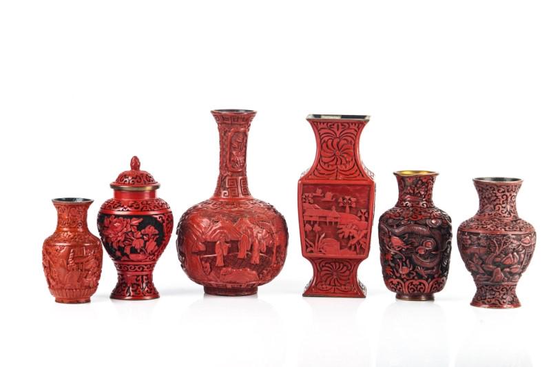 GROUP OF 6 CINNABAR LACQUER CARVED VASES: Including 1 square vase, 1 two-toned black with cover. 4 rounded vases. 19th to early 20th C. Tallest: 23cm (9 in.)