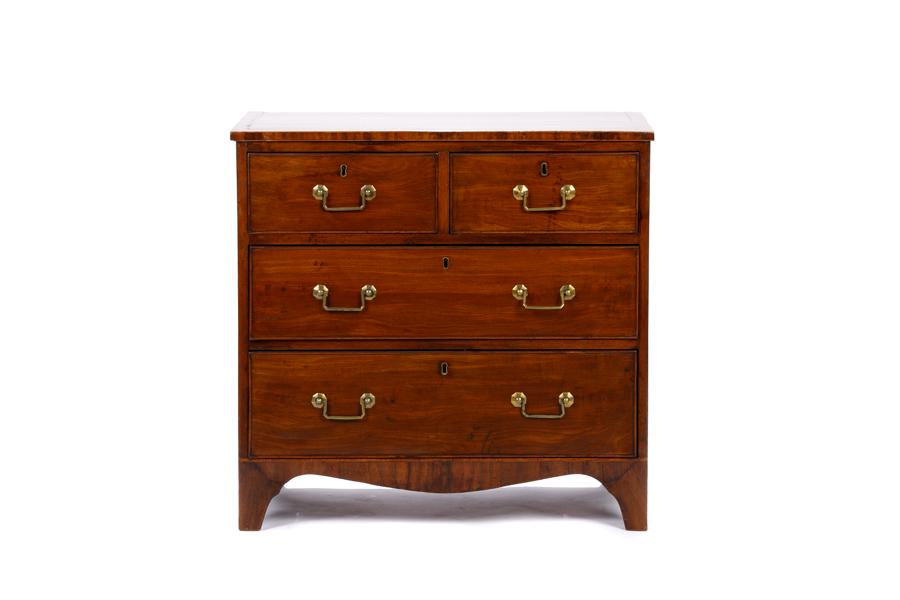 GEORGE III MAHOGANY FOUR DRAWER BACHELOR: With brass hardware and escutcheons. H. 29 1/2 W. 30 1/2 D. 19 in. Provenance: W. Wingate & Johnston Fine Art through Robert Dirstein.