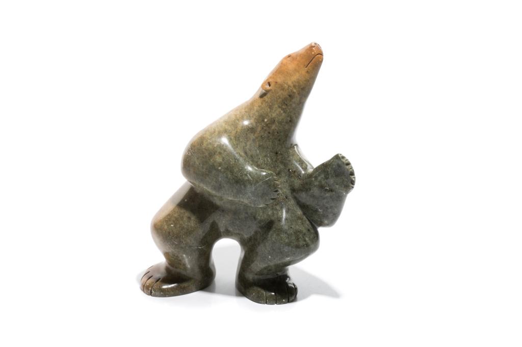 DARREL NASOGALUAK (TUKTOYAKTUK): Standing Bear Inuit green soapstone Signed and dated to base '96 H. 26.5cm (10 1/2in)