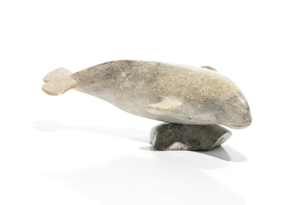 NICHOLAS (NI KA CI): Swimming Whale Green Inuit soapstone Signed in syllabics with disc E8-48 L. 29cm (11 1/2in)