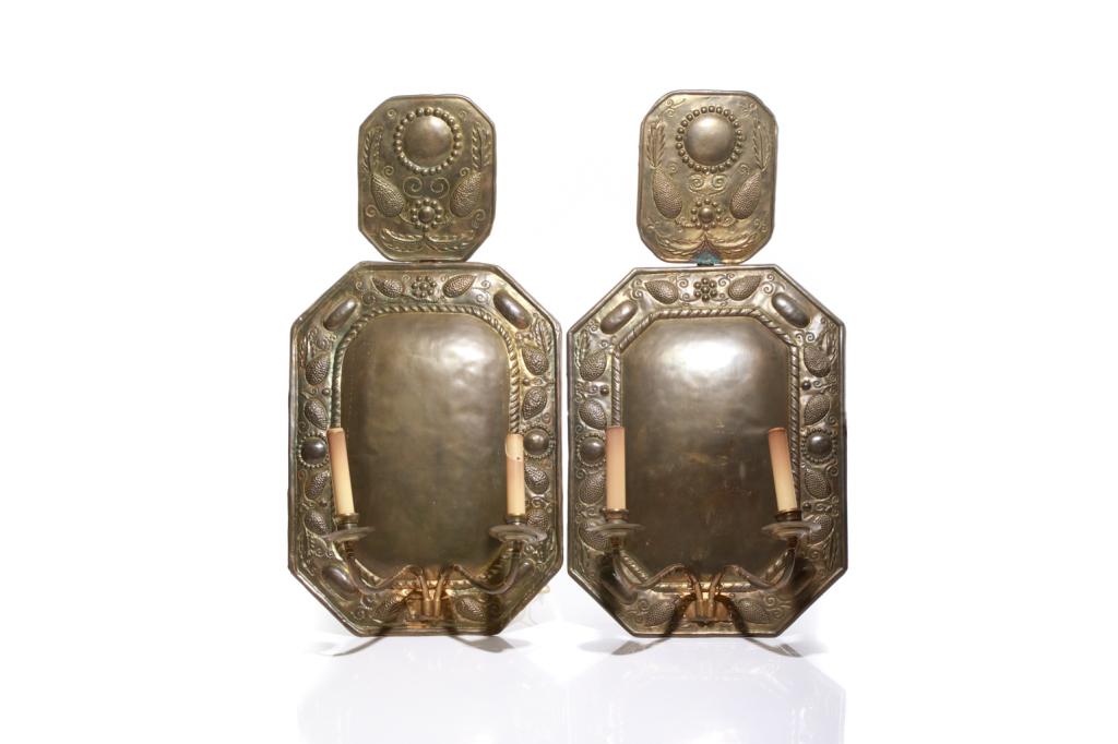 PAIR OF 19TH C DUTCH BRASS WALL SCONCES: With foliate decoration and an attached top portion. Both have been electrified. H. 69 cm (27 1/8 in.) Condition noted.