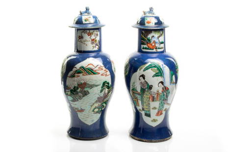 PAIR OF POWDER BLUE GROUND FAMILLE VERTE VASES: 清康熙 灑藍地描金五彩開光山水人物圖蓋瓶（一對）Painted in