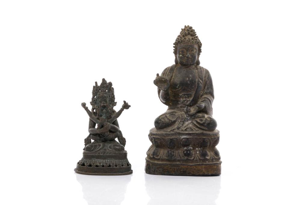 TWO CHINESE TIBETAN BRONZE BUDDHIST FIGURES: 清 銅佛像（兩尊）Qing dynasty. Taller statue: 20cm (8 in.) Provenance: Collection of Mark and Suzanne Gayn