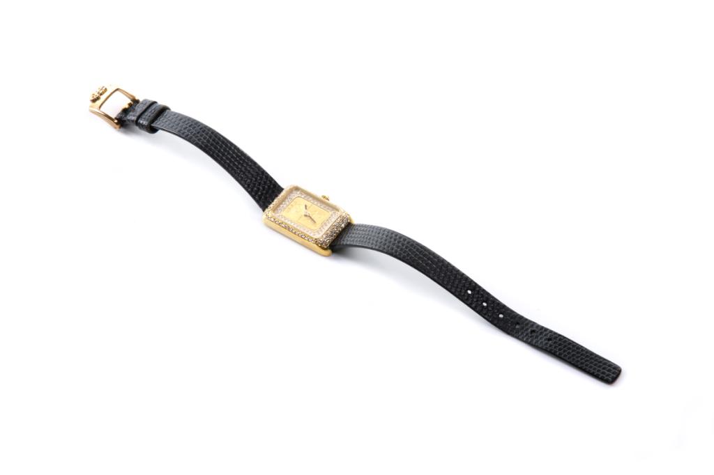 LADY'S GOLD CORUM WRIST WATCH (1 of 4)