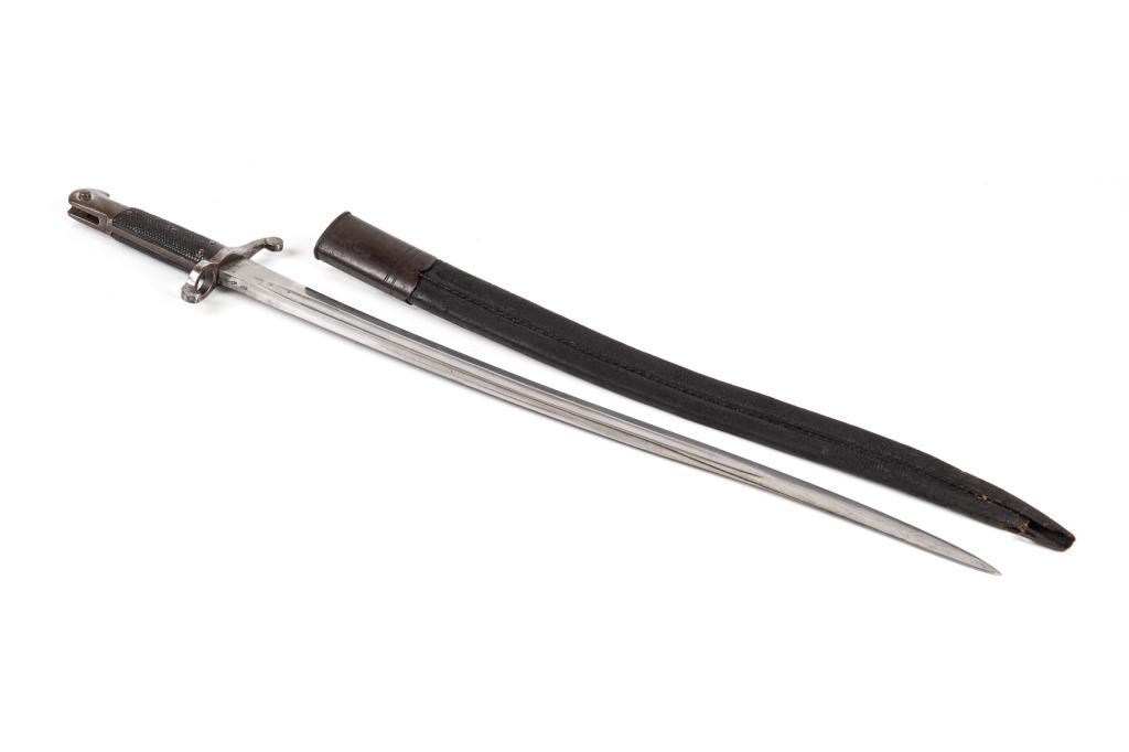 SNIDER ENFIELD YATAGHAN BAYONET: A mid 19th century English Yataghan style bayonet for the Snider Enfield rifle. Circa 1860. Blade marked for War department as well as proof and regimental markings.