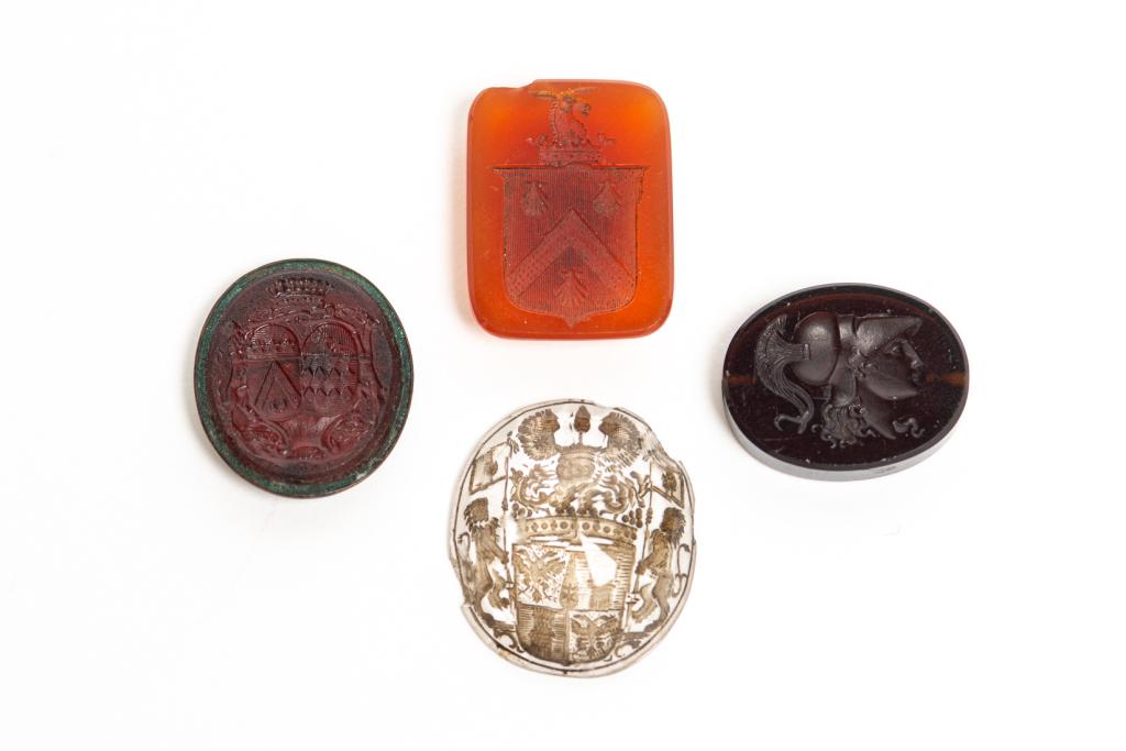 GROUP OF FOUR ASSORTED SEAL MATRICES (1 of 6)