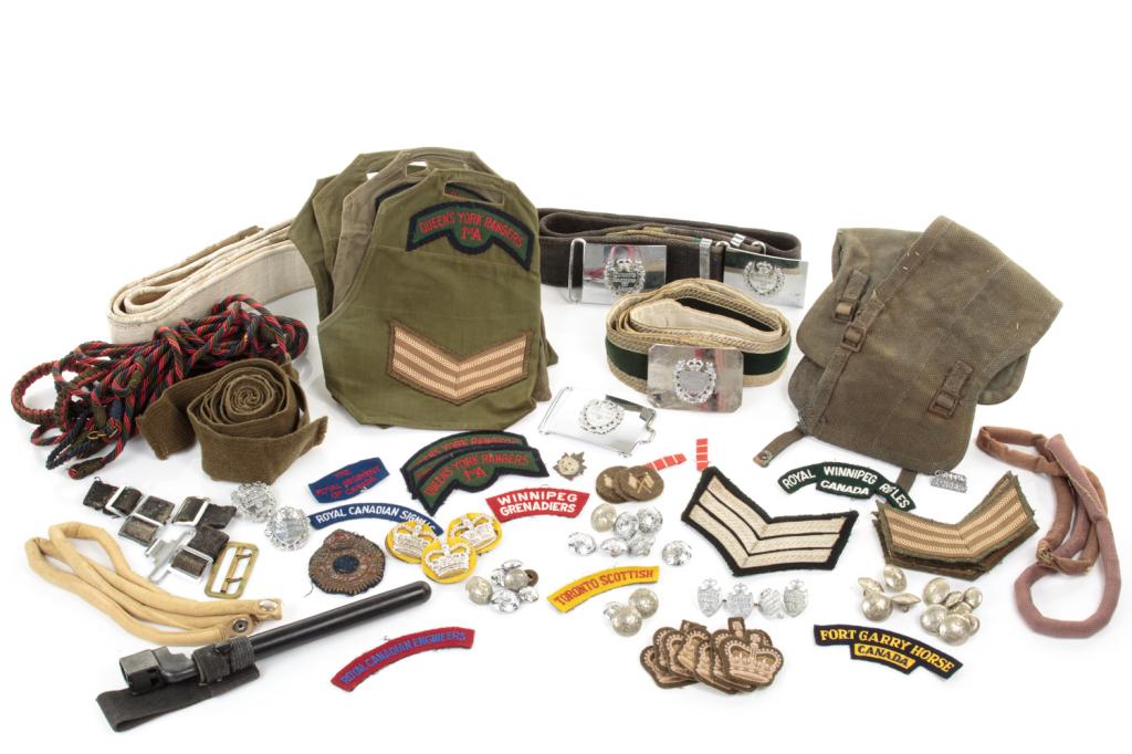 LOT OF ITEMS FROM THE QUEEN: A collection of items related mostly to the Queen's Rangers First American including insignia, belts puttees, spike bayonet etc.