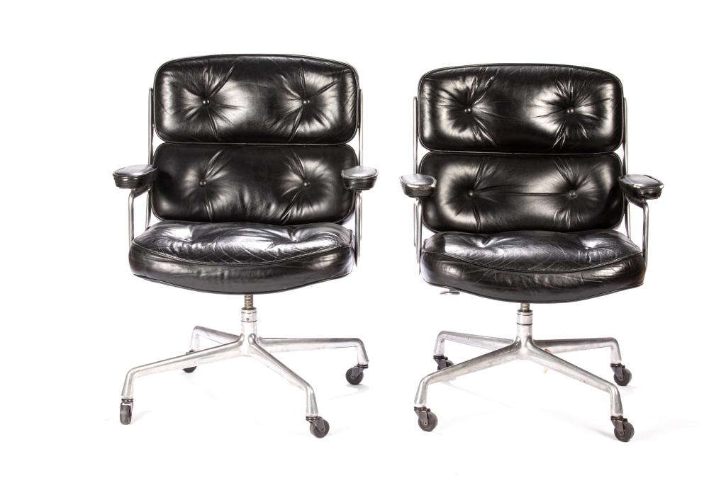PAIR OF EAMES TIME LIFE DESK CHAIRS: With black leather upholstery and chrome frames. H. 92 W. 69 in