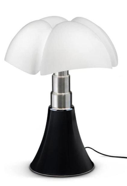 GAE AULENTI PIPISTRELLO TABLE LAMP: Designed by Martinelli Luce in black with a white floral form shade and extension base. Approximate height at where it is sitting in the photos: 28 in. Approximate height when fully extended: 34 in. A